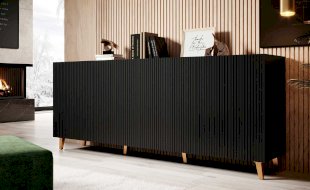 Czarna komoda na nóżkach – eleganckie meble do salonu i sypialni
